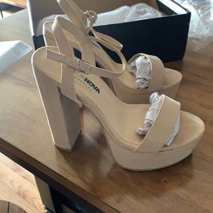 Nude platform heels
